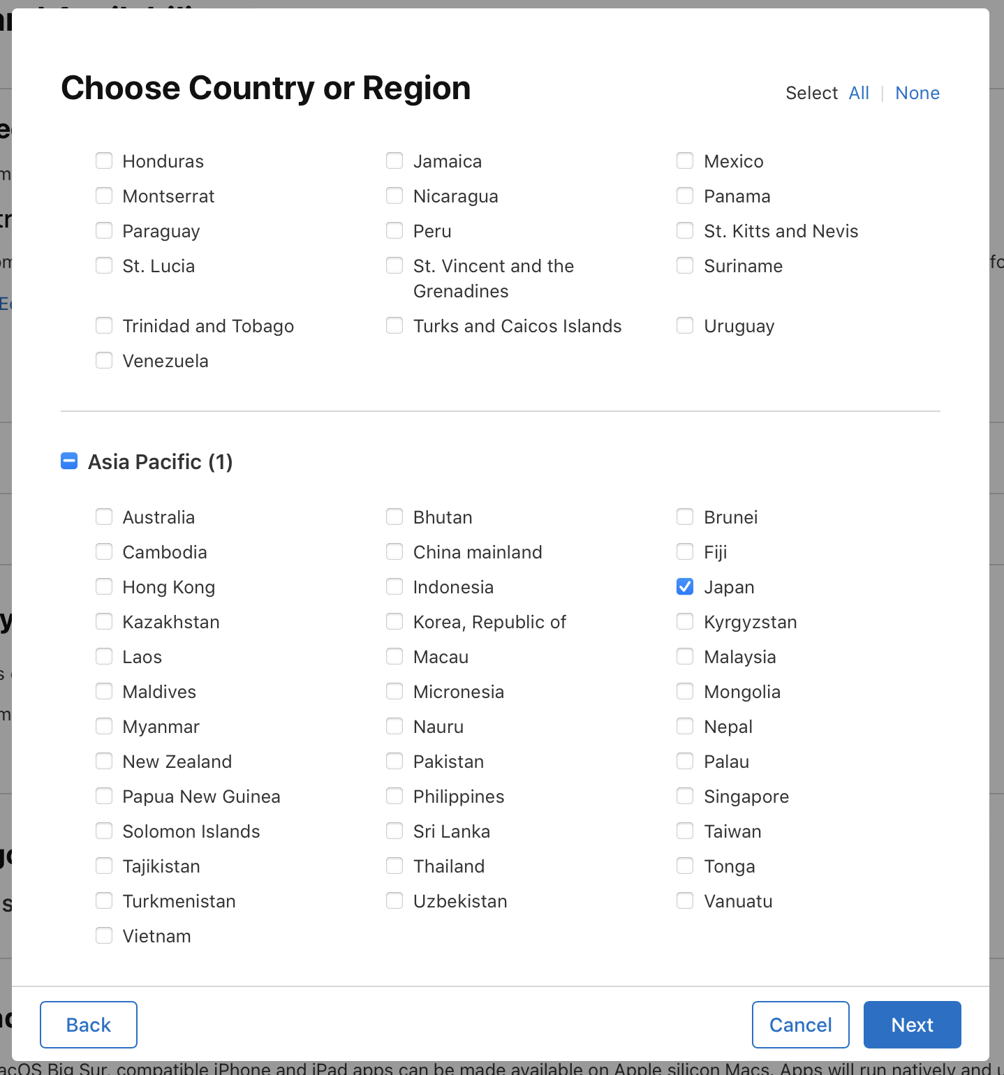 Screenshot of the Choose Country or Region dialog, where there are options to select countries and regions. At the bottom of the dialog, the Back button is on the left, and the Cancel and Next buttons are on the right.